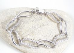 Silver bracelet with white stone