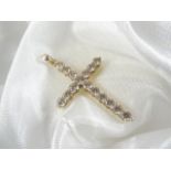 Gold cross set with 2 ct diamond