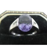 9k white gold ring with Iolite