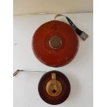 2 Vintage leather bound tape measures