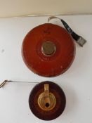 2 Vintage leather bound tape measures