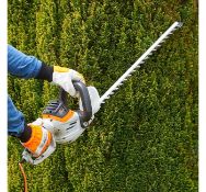 (JH36) 710W Rotatable Hedge Trimmer Strong, precision blades are 61cm long and effortlessly cu...