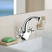 (J9) Classic Basin mixer tap. This traditional styled chrome lever basin mixer tap' Classic ran...