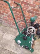 vintage cutter and roller with grass box