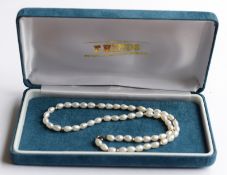 Set Of Pearls With Gold Coloured Beads And Clasp