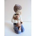 Lladro Nao Boy with Puppy Figurine