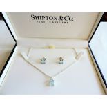 Sterling Silver Topaz Necklace and Earrings Set