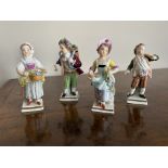 Set of four miniature porcelain figures by sitzendorf