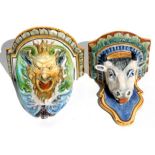 Two maiolica wall brackets