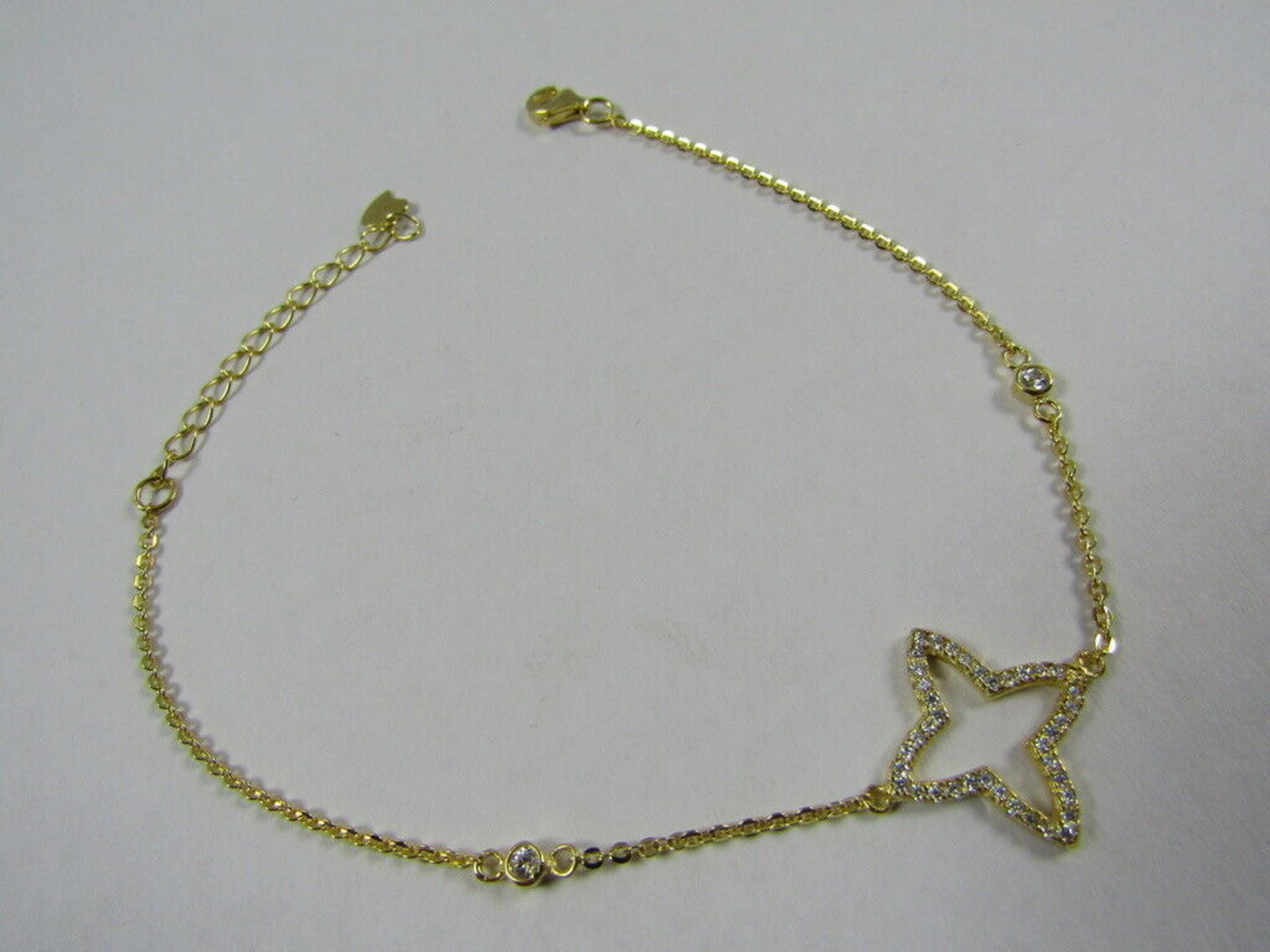 10 x ANKLE BRACELET. STAR WITH CLEAR STONES.