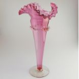 A giant Victorian cranberry glass Trumpet Vase C.19thC