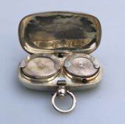 A solid silver Full & Half double Sovereign Holder by Sampson Mordan C.1905