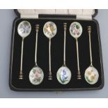 A good set of solid silver and gilt & floral enamel Coffee spoons with seal ends - cased C.1968