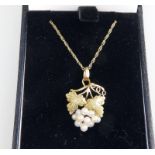 A 14 ct gold designer Pendant and chain, boxed