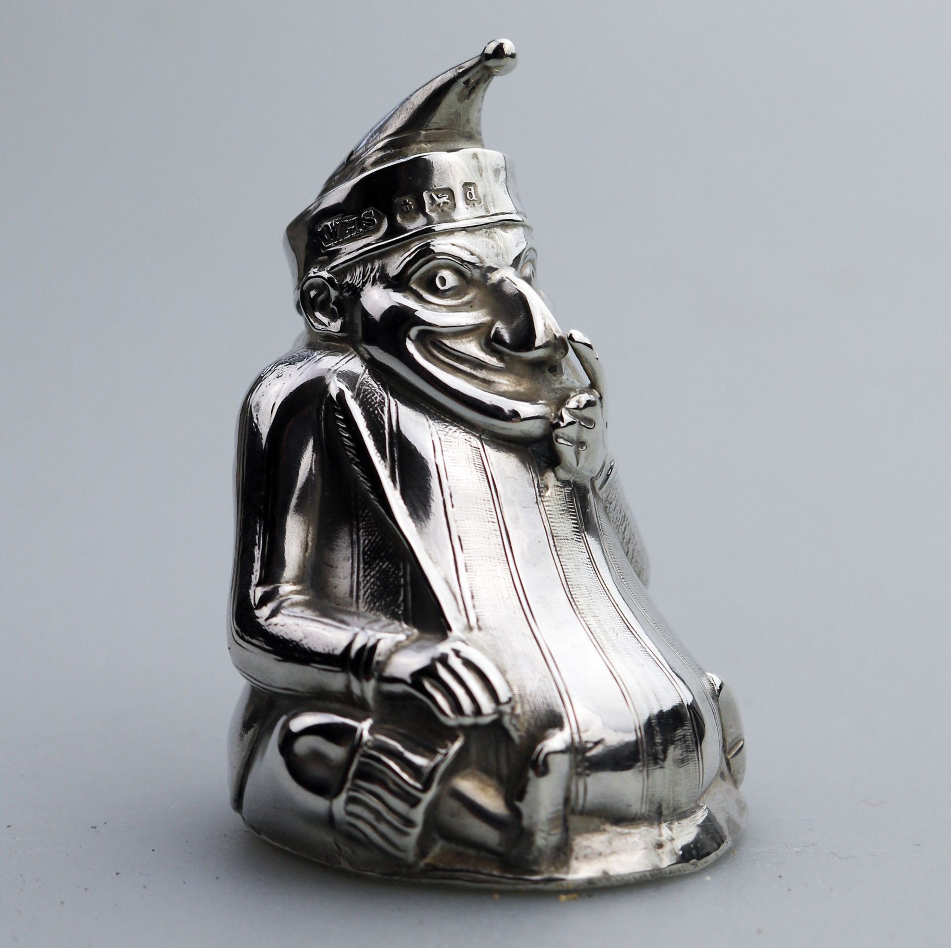 A rare solid silver novelty Mr Punch Pepper shaker by William Sparrow C.1903