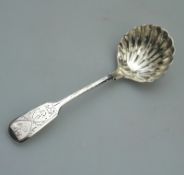 A solid silver engraved Sifter Ladle by Robert Stebbings C.1902