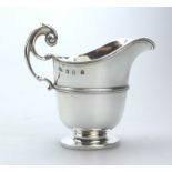 A Scottish solid silver helmet shaped Jug by Brook & Son C.1899