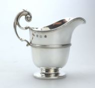 A Scottish solid silver helmet shaped Jug by Brook & Son C.1899