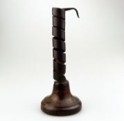 A rare 18th century coiled steel and fruitwood Candlestick / rat de cave C.18thC