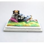 A European bisque porcelain novelty humorous Dog Desk Weight C.19thC