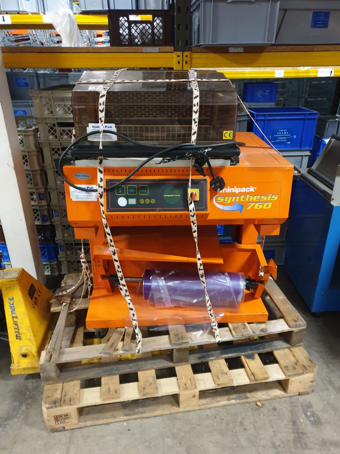 2 shrink wrapping machines