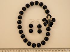 An Obsidian Necklace And Matching Earrings