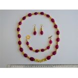 A Ruby And Chinese "Pixiu" Necklace And Matching Earrings