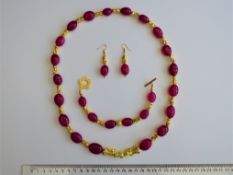 A Ruby And Chinese "Pixiu" Necklace And Matching Earrings