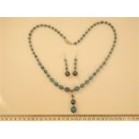 An Aquamarine And Shell Pearls Necklace And Earrings Set