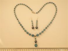 An Aquamarine And Shell Pearls Necklace And Earrings Set