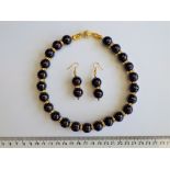 A Garnet Necklace And Earrings Set