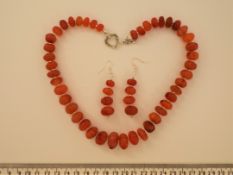 An Antique Tibetan Carnelian Necklace With Earrings