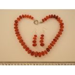 An Antique Tibetan Carnelian Necklace With Earrings