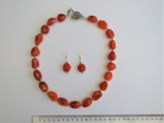 A Carnelian Necklace With Matching Earrings