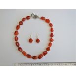 A Carnelian Necklace With Matching Earrings