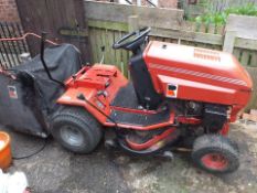 Ride on lawn mower tractor with basket