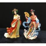 A pair of Danbury Mint fine porcelain oriental figures.