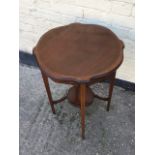 Antique mahogany inlaid occaisional table with raised under teir.