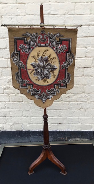 An antique Regency period adjustable pole screen with beaded panel