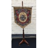 An antique Regency period adjustable pole screen with beaded panel