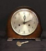 A vintage wooden cased mantle clock by Smiths of Enfield