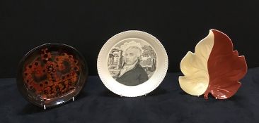 A group of three assorted plates