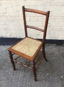 Antique Victorian side chair with caned seat.