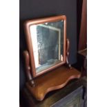 Antique Victorian scroll arm toilet mirror.