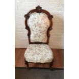 An antique Victorian high back Nursing Chair.