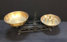 A set of vintage kitchen scales and weights