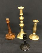 A group of 4 assorted antique candlesticks