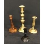 A group of 4 assorted antique candlesticks