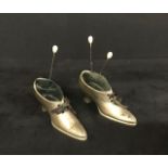 Antique pair of Victorian pewter pin cushion shoes