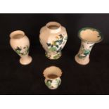 A group of four assorted 'Masons' Chartruese pattern Vases